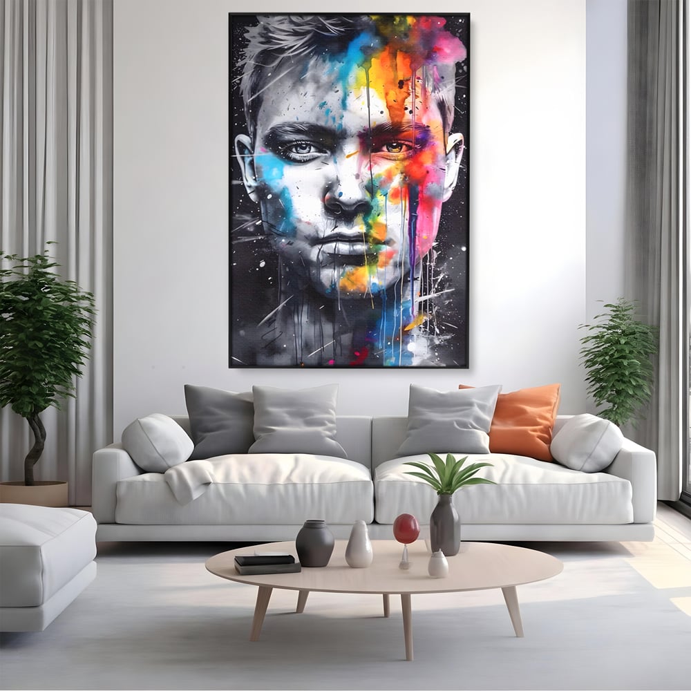 Tablou canvas cu tablou canvas portret barbat cu pete de culoare, in rama de aluminiu negru, pe perete intr-un living